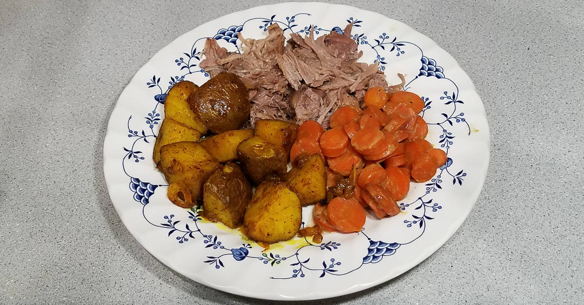 Gingered Carrots served with pulled pork and turmeric potatoes