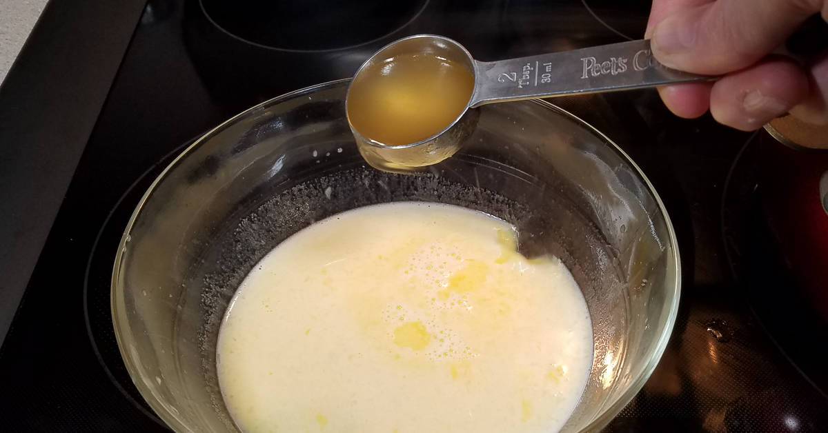 Greek Lemon Soup adding stock to temper the egg mixture