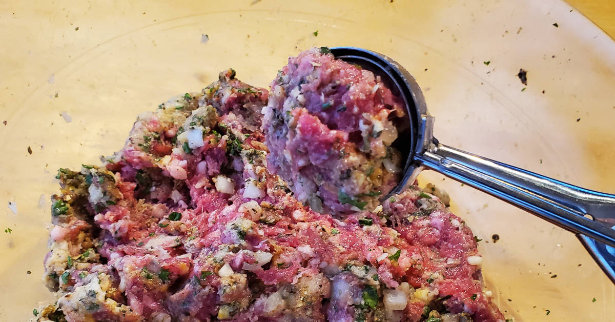 Greek Style Meatballs forming meatball with scoop