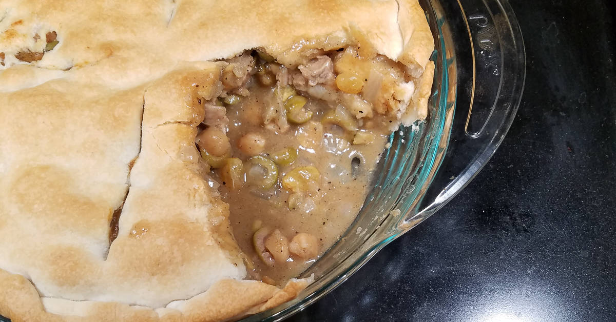 Moroccan Chicken Pot Pie with a scoop taken out