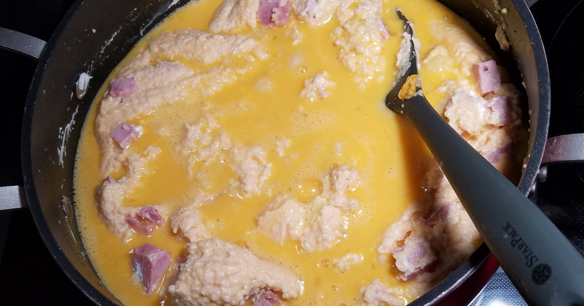 Grits and Ham Casserole whisked eggs in pot