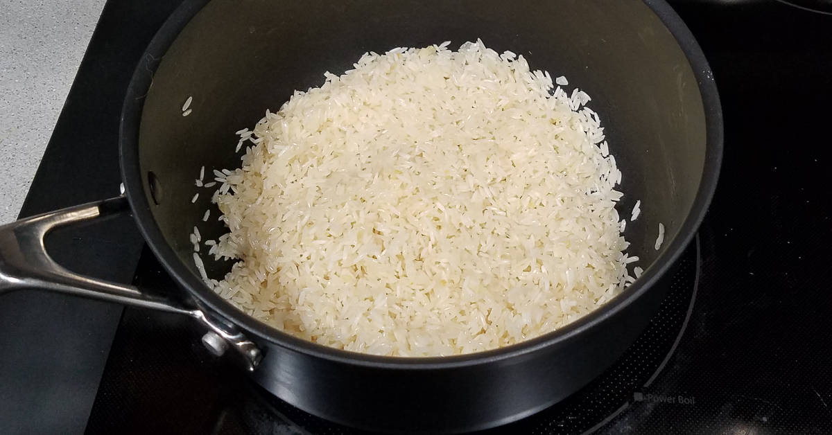 Rice Pilaf rice stirred to coat with butter