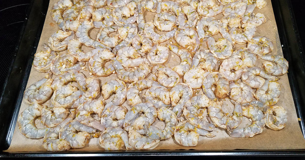 Crunchy Lemon Lime Shrimp shrimp on the baking pan