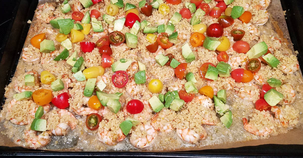 Crunchy Lemon Lime Shrimp topped with tomatoes and avocado