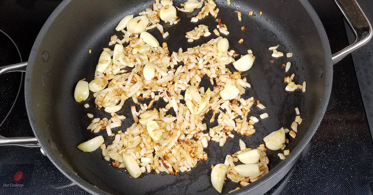 Creamy Garlic Bacon Chicken garlic added to the pan