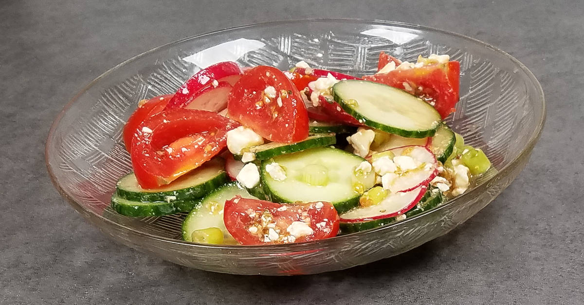 Cucumber Tomato and Radish Salad on a plate