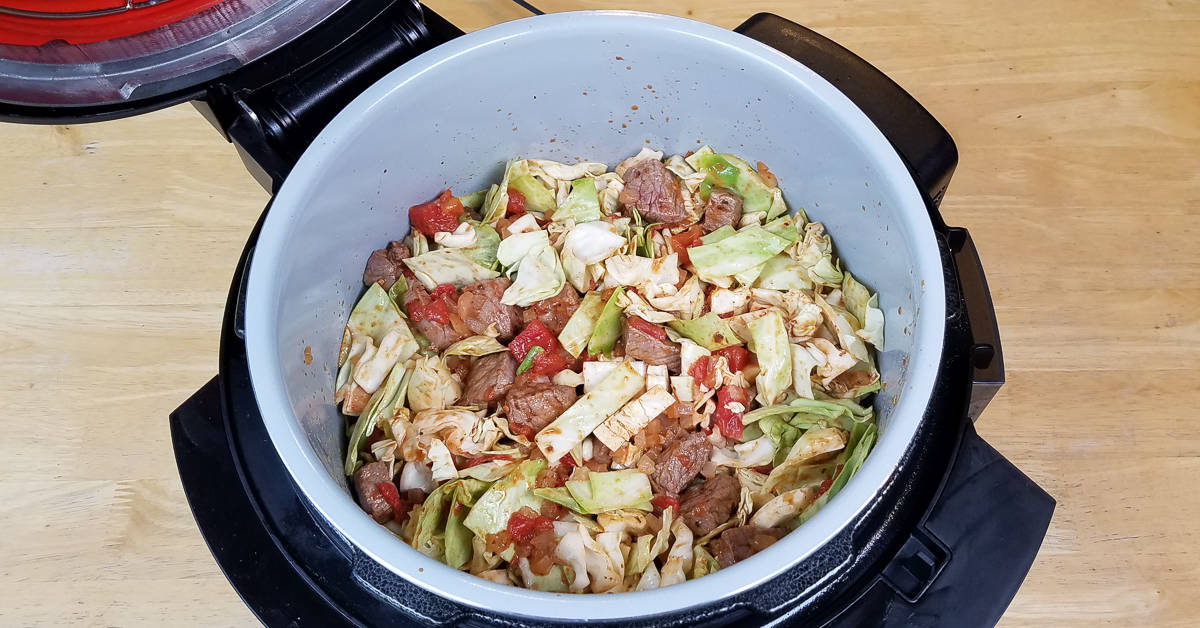 Turkish Beef and Cabbage cabbage mixed into pot