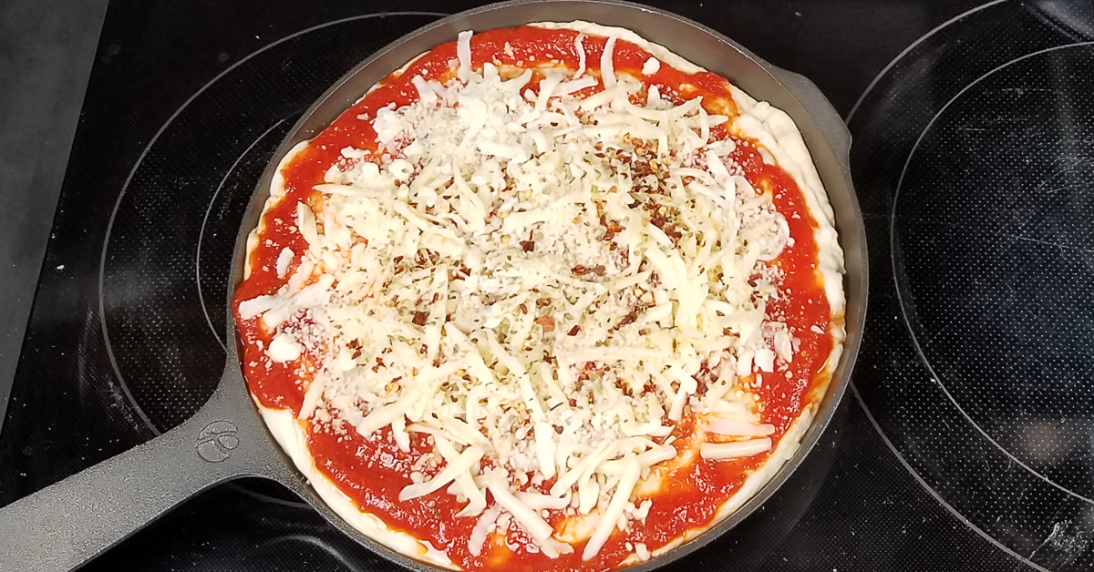 Chicago Style Stuffed Pizza cheese and spices added to pizza
