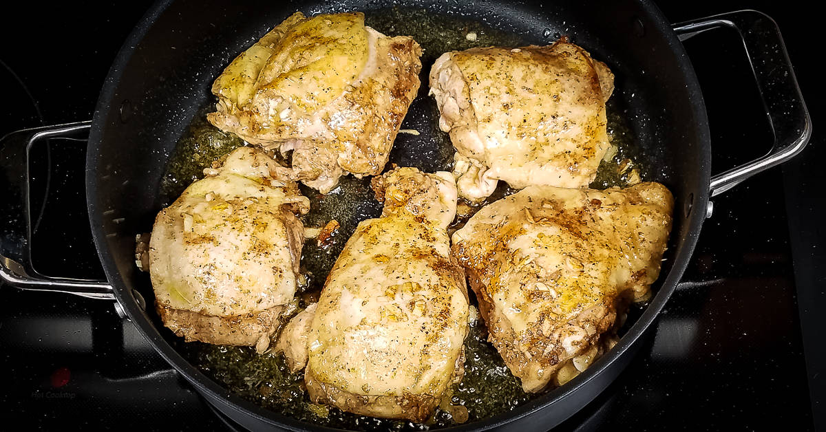 Middle Eastern Chicken and Rice chicken cooking skin side up