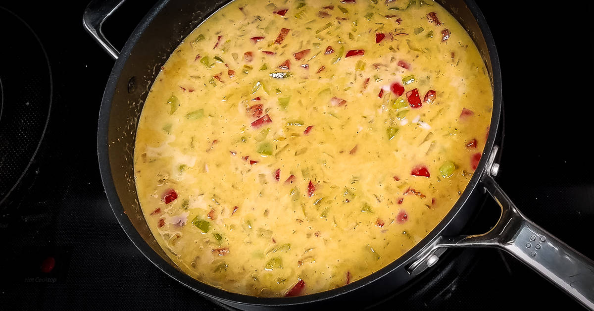 Spicy Mac and Cheese seasonings coconut cream added to pan