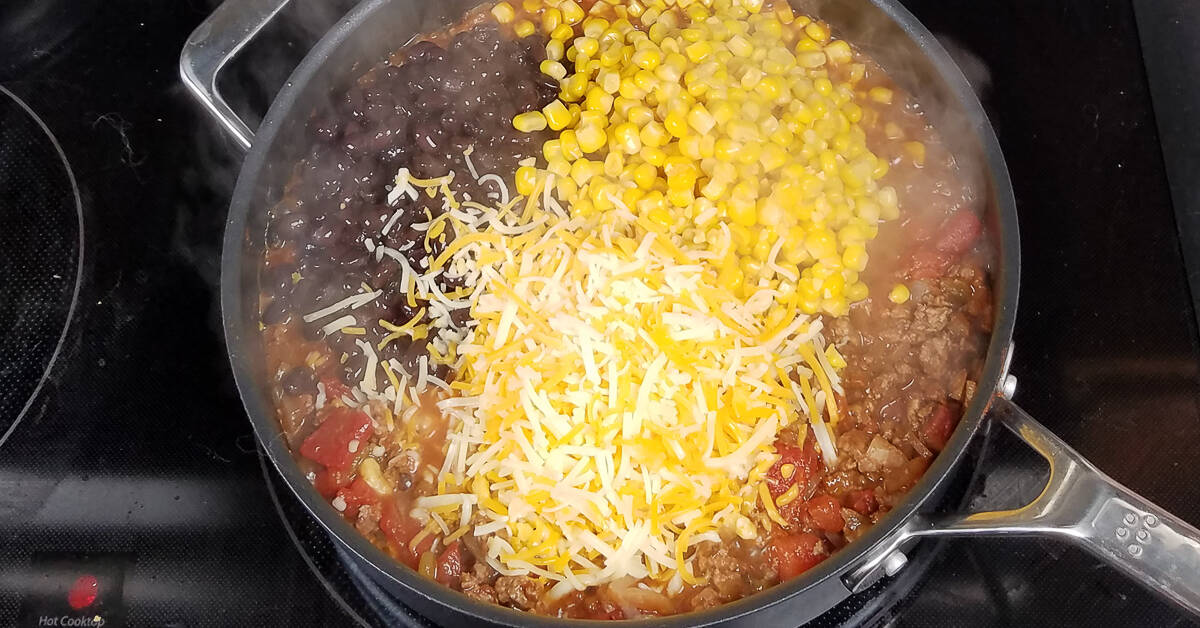 Tex Mex Casserole adding black beans corn and cheese