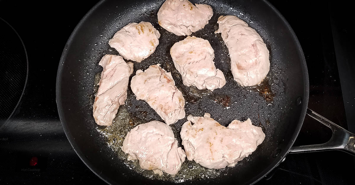 Apricot Pork Tenderloin Medallions cooking in the pan