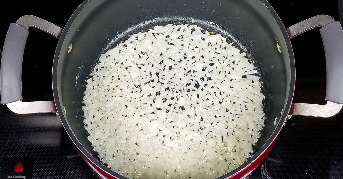 Creamy Zucchini Soup sauteing onions