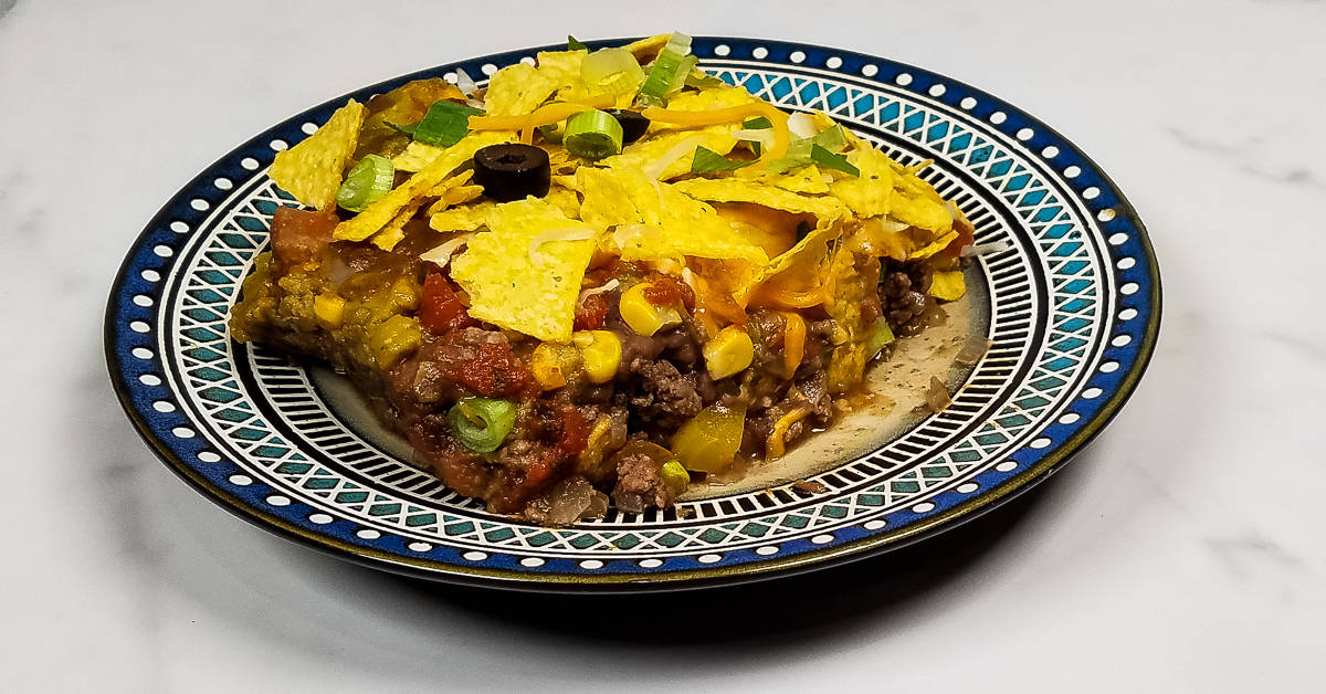 Layered Tex Mex Casserole served on a plate