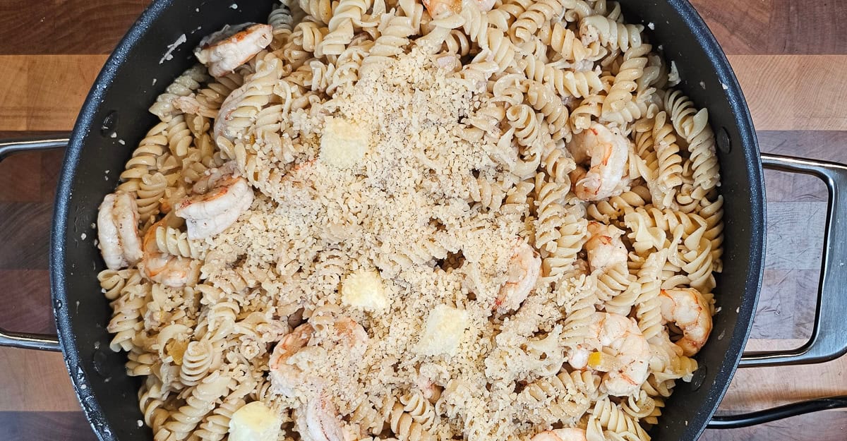 Middle Eastern Flavored Shrimp and Pasta adding butter, cheese, and pasta water