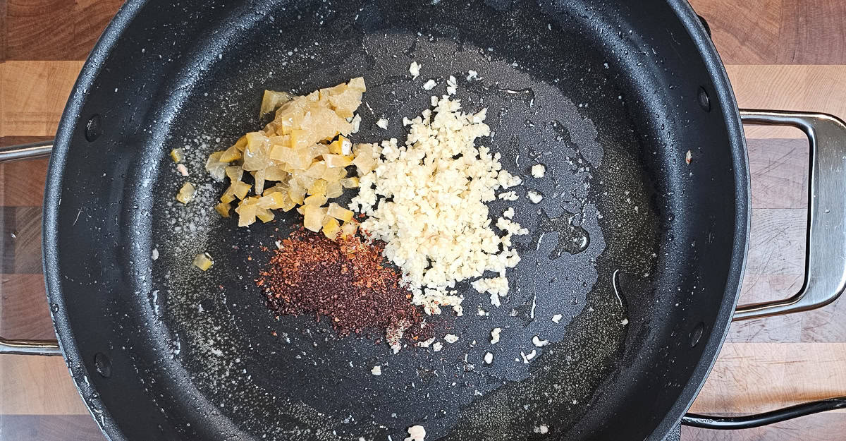 Middle Eastern Flavored Shrimp and Pasta preserved lemon, garlic, and spices in the pan