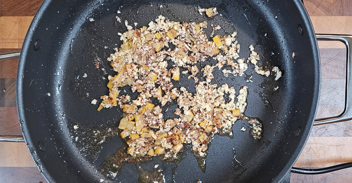 Middle Eastern Flavored Shrimp and Pasta sauteing the seasonings