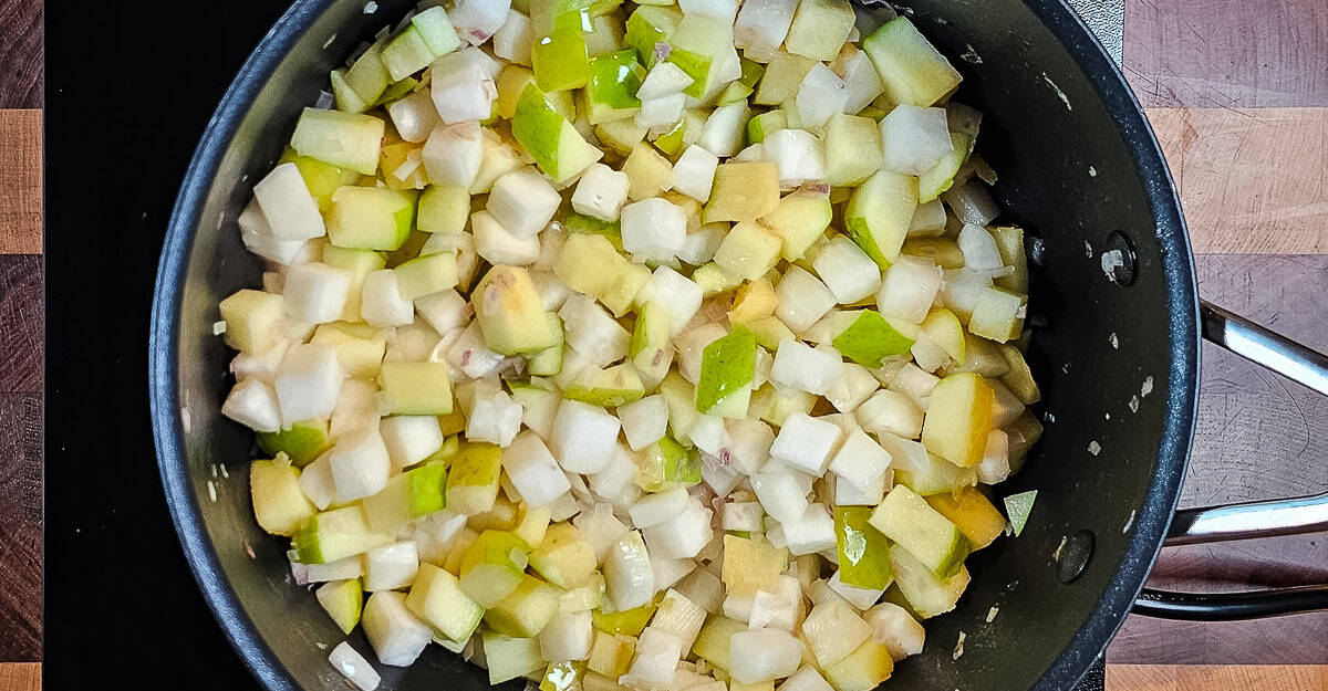 Turnip and Apple Soup turnips and apples added to the pan