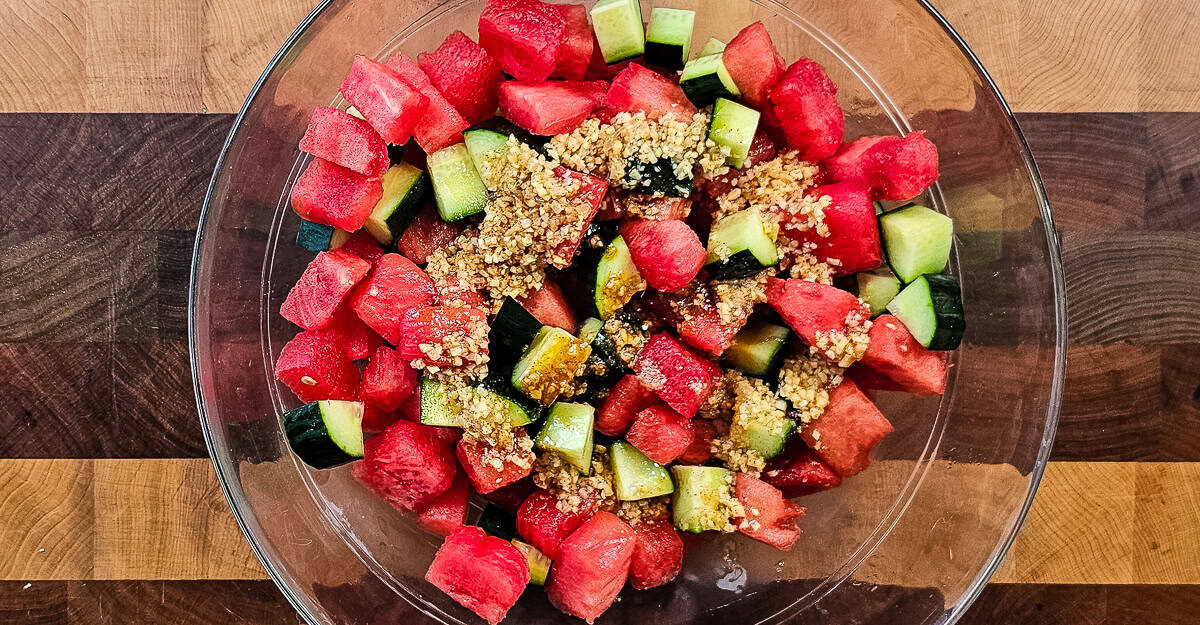 Watermelon and Cucumber Salad sauce poured over the fruit