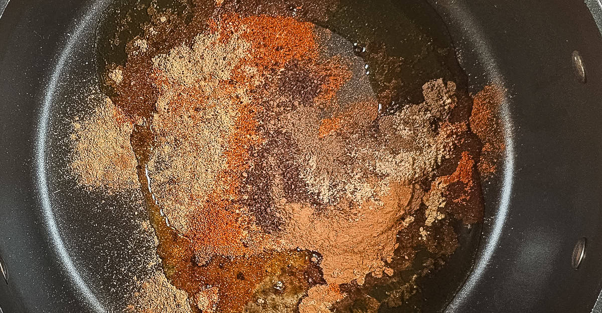 North African Flavored Lamb Soup spiced added to the pot