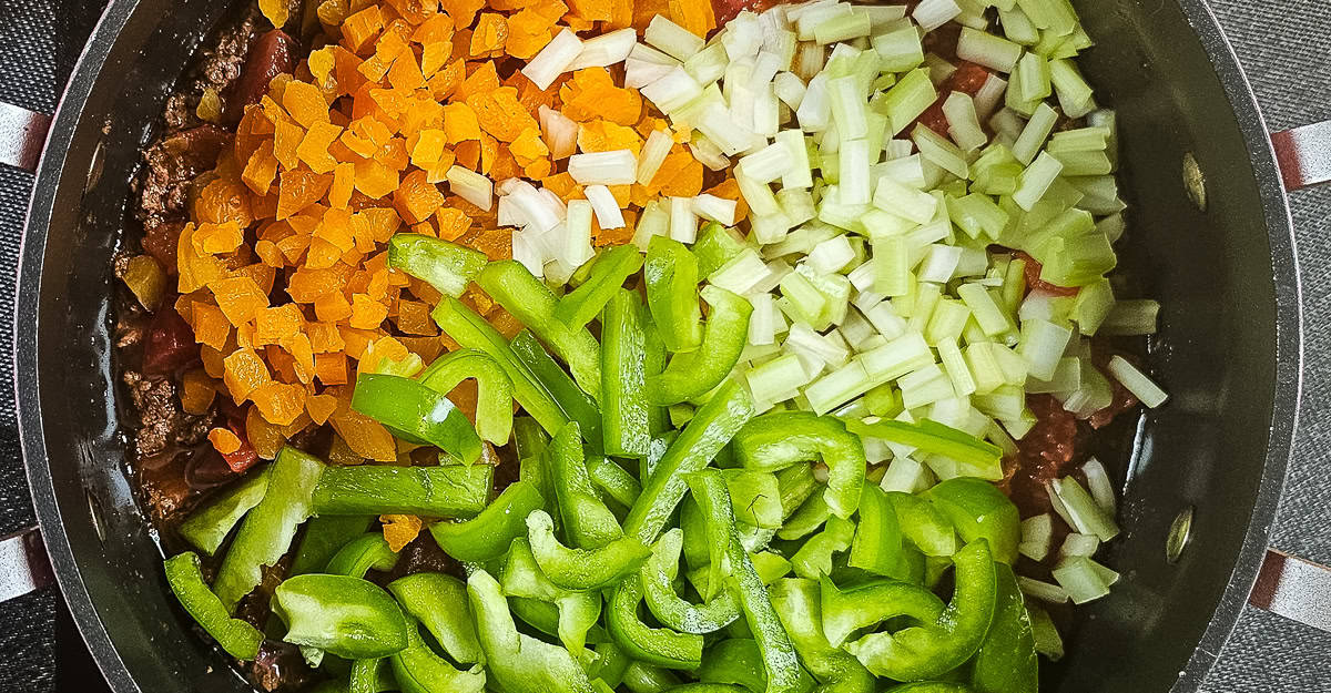 North African Flavored Lamb Soup vegetables added to the pot