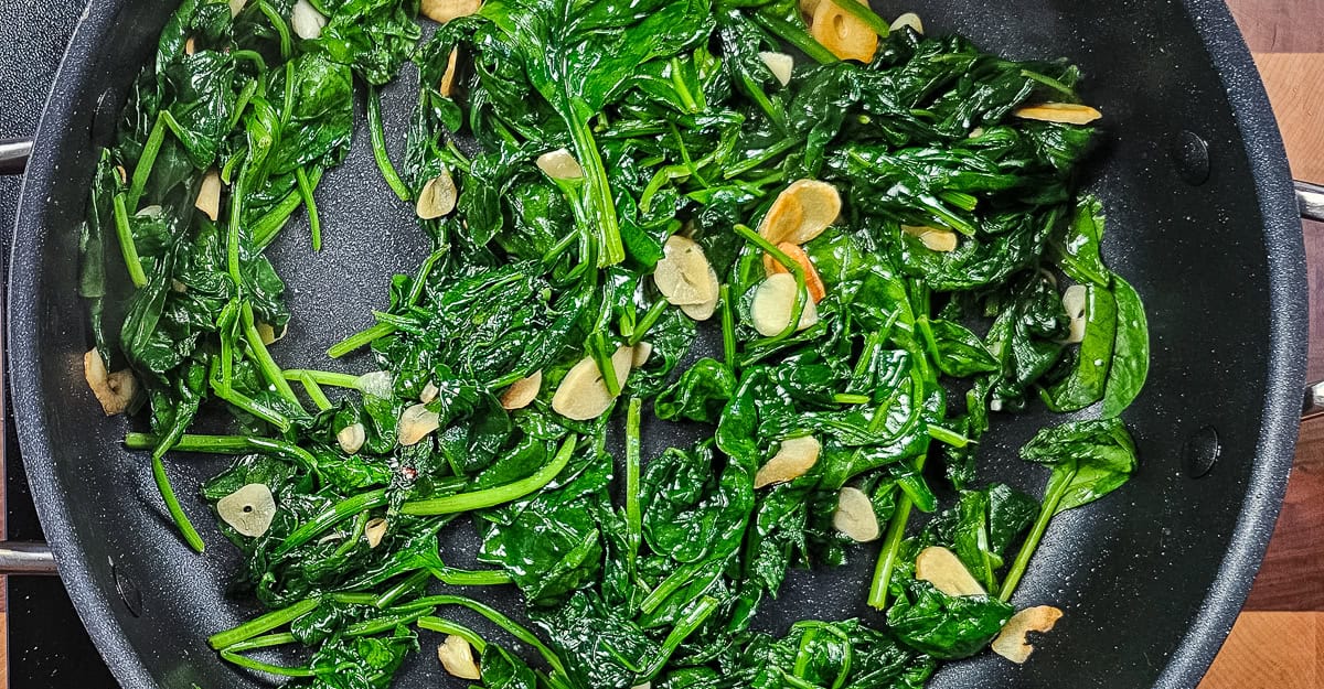 Sautéed Spinach With Garlic and Sour Cream cooking all the spinach