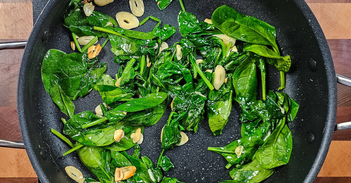 Sautéed Spinach With Garlic and Sour Cream cooking spinach