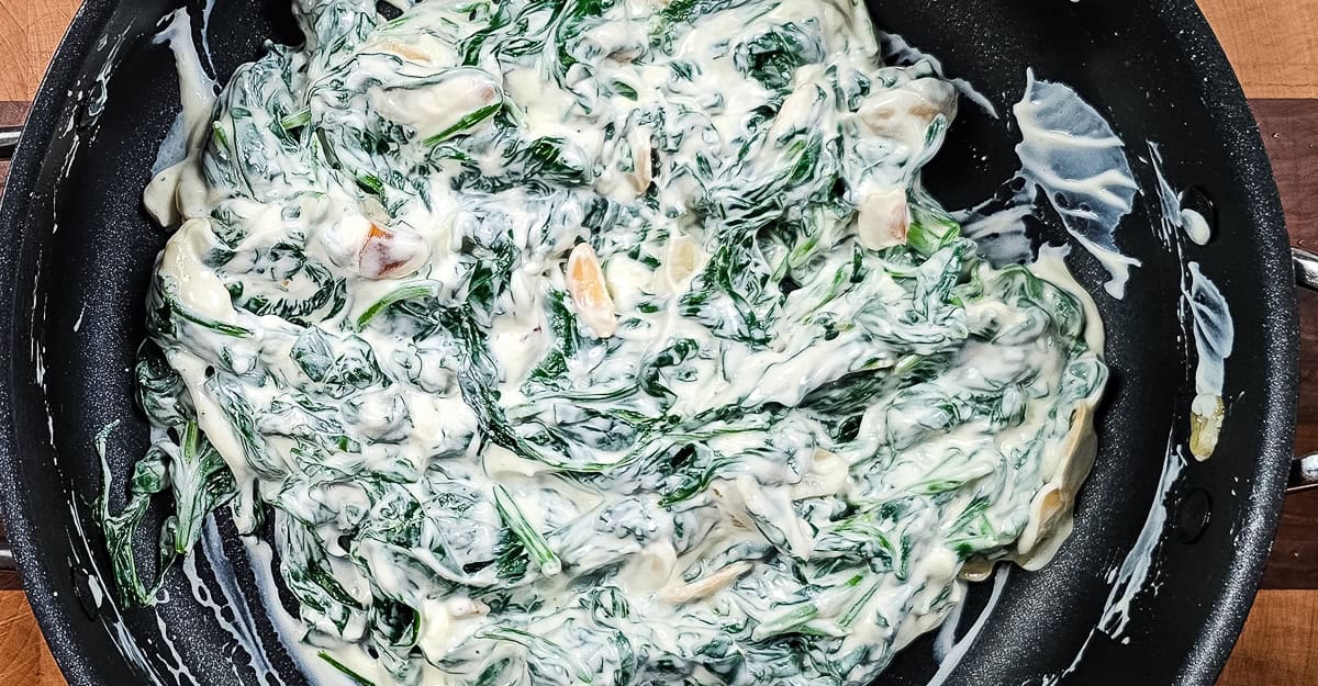 Sautéed Spinach With Garlic and Sour Cream mixing everything togehter